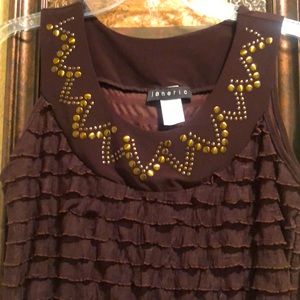 NWOT Janeric brand Dressy ruffles top.  Bronze metal embellishment.  Romantic